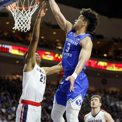 Brigham Young Cougars guard Elijah Bryant takes a shot with Gonzaga Bulldogs guard Zach Norvell Jr. defending during the West Coast Conference championship game in Las Vegas on Tuesday, March 6, 2018.