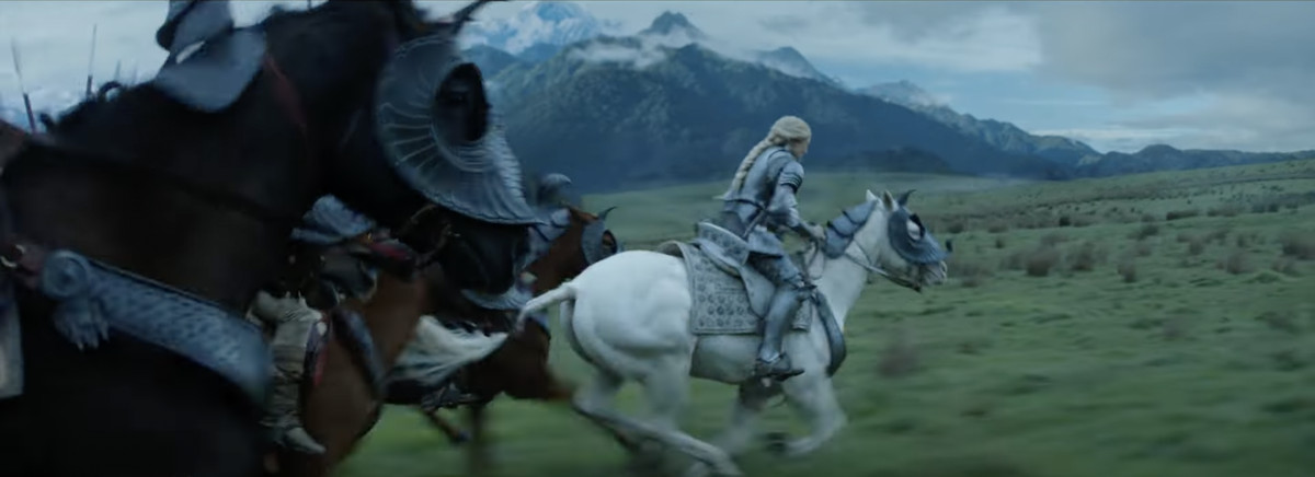 Galadriel and company riding hard across plains in The Lord of the Rings: The Rings of Power. 