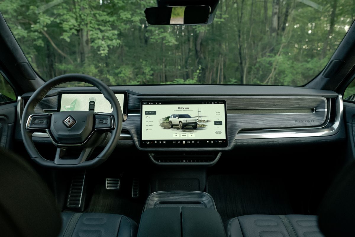 The interior of the Rivian R1S shows the screens