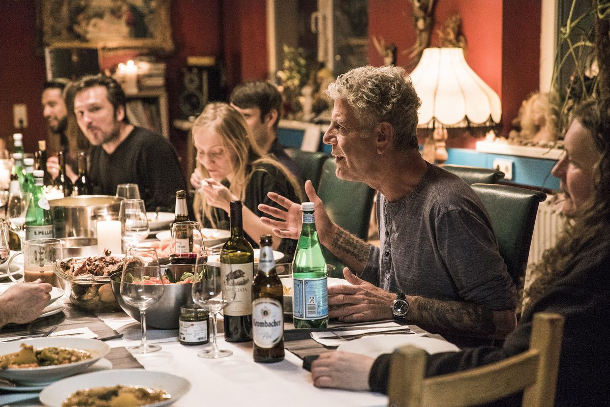 Anthony Bourdain during a dinner scene from Parts Unknown in Berlin, Germany