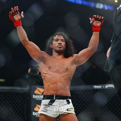 Benson Henderson raises his hands in victory at Bellator 208 at the Nassau Coliseum in Uniondale, N.Y.