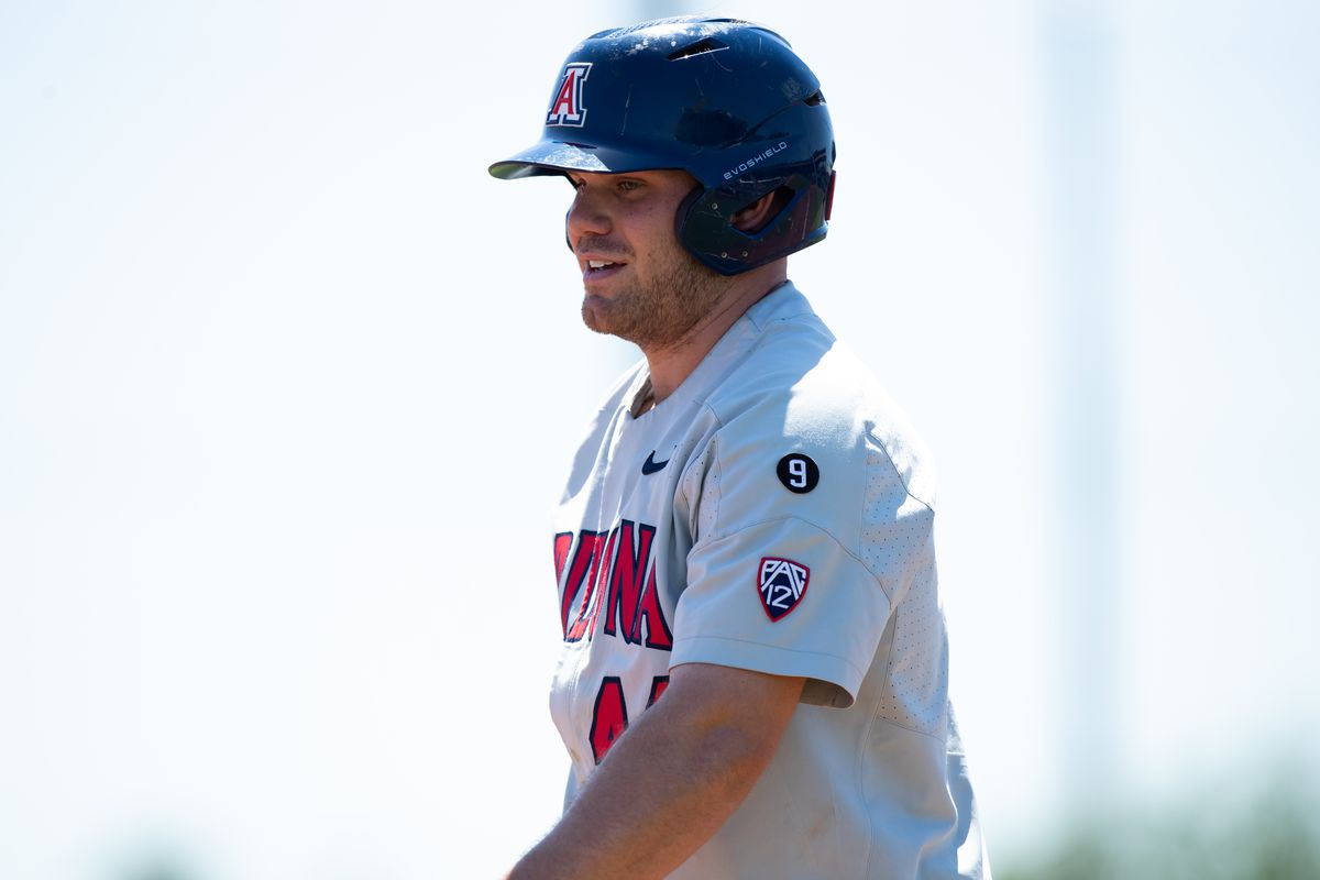 Tanner O’Tremba smiling while wearing an Arizona Wildcats helmet