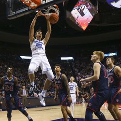 Brigham Young Cougars forward Gavin Baxter (25) dunks the ball against St. Mary's Gaels at the Marriott Center in Provo on Thursday, Jan. 24, 2019.
