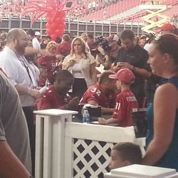 Patrick Peterson and Tyrann Mathieu from afar as they sign