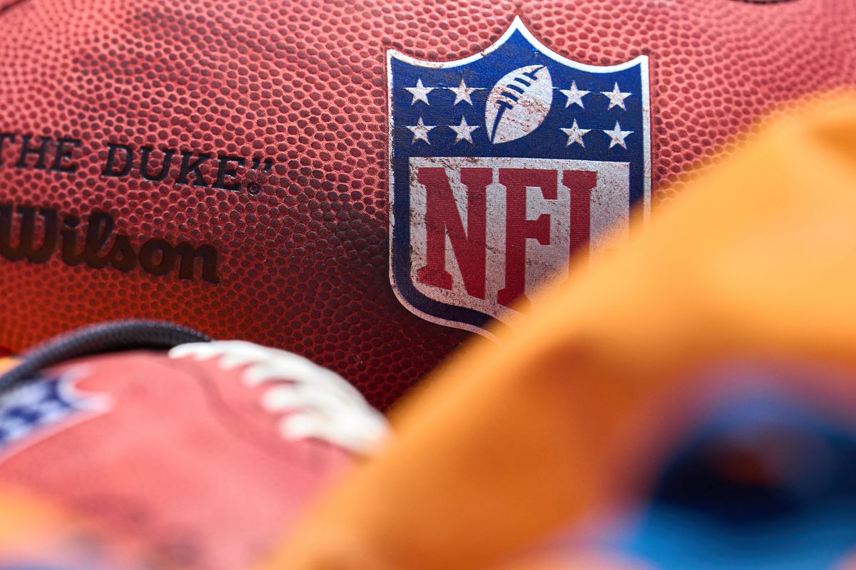 A detail view of the NFL logo crest is seen on a Wilson football during the the Chicago Bears Minicamp on June 14, 2022 at Halas Hall in Lake Forest, IL.