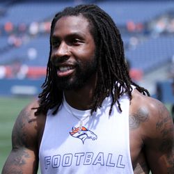 Broncos S and fan favorite David Bruton is all smiles for fans after practice