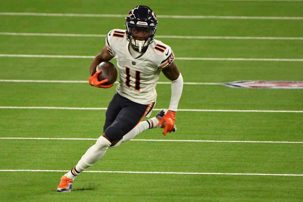 Chicago Bears wide receiver Darnell Mooney heads up field with a pass during the second quarter against the Los Angeles Ramsat SoFi Stadium.