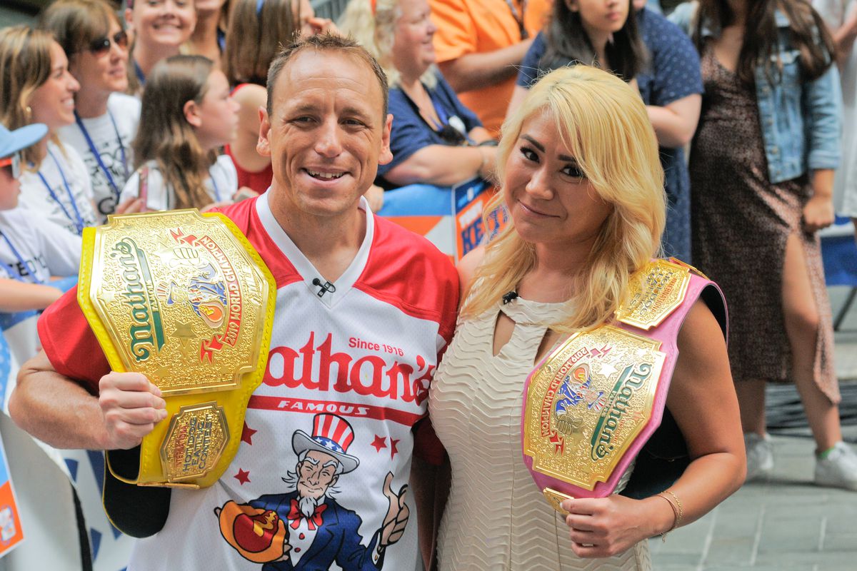 Competitive Eaters Joey Chestnut and Miki Sudo seen during Country Music Star, Toby Keith’s performance in New York City on NBC’s Today Show.