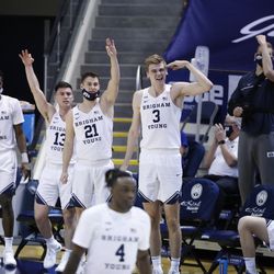 BYU’s bench celebrates defends during the Cougars’ 87-71 victory over Texas Southern at the Marriott Center in Provo on Monday, Dec. 21, 2020.
