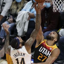 New Orleans Pelicans forward Brandon Ingram (14) shoots as Utah Jazz center Rudy Gobert (27) guards him during an NBA game at the Vivint Arena in Salt Lake City on Friday, Nov. 26, 2021. The Jazz lost 97-98.