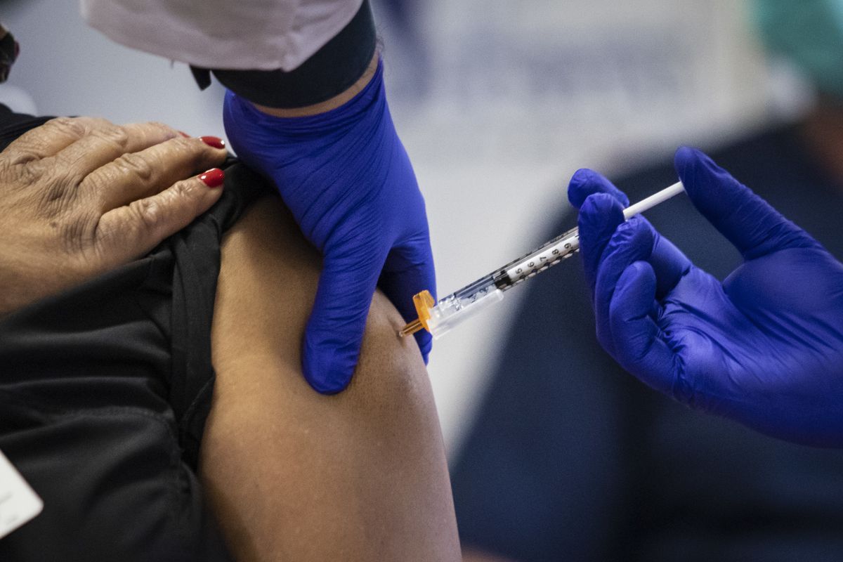 A second dose of the Pfizer-BioNTech COVID-19 vaccine is administered at Norwegian American Hospital on the West Side in January.