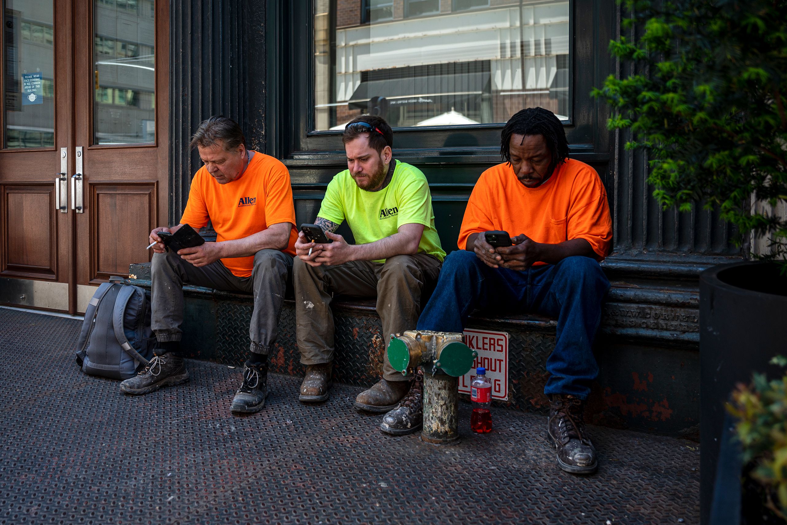 Construction workers enjoy a break in Lower Manhattan, May 17, 2022.