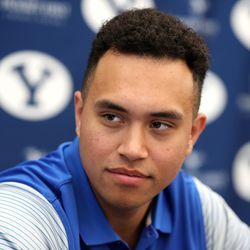 BYU tight end Moroni Laulu-Pututau talks with media members during the BYU football media day in the BYU Broadcasting Building no the BYU campus in Provo on Friday, June 22, 2018.