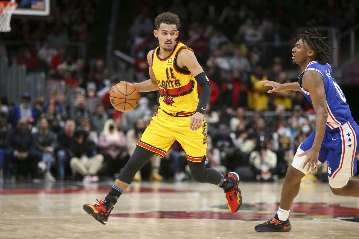 Atlanta Hawks guard Trae Young (11) dribbles against the Philadelphia 76ers in the second half at State Farm Arena.