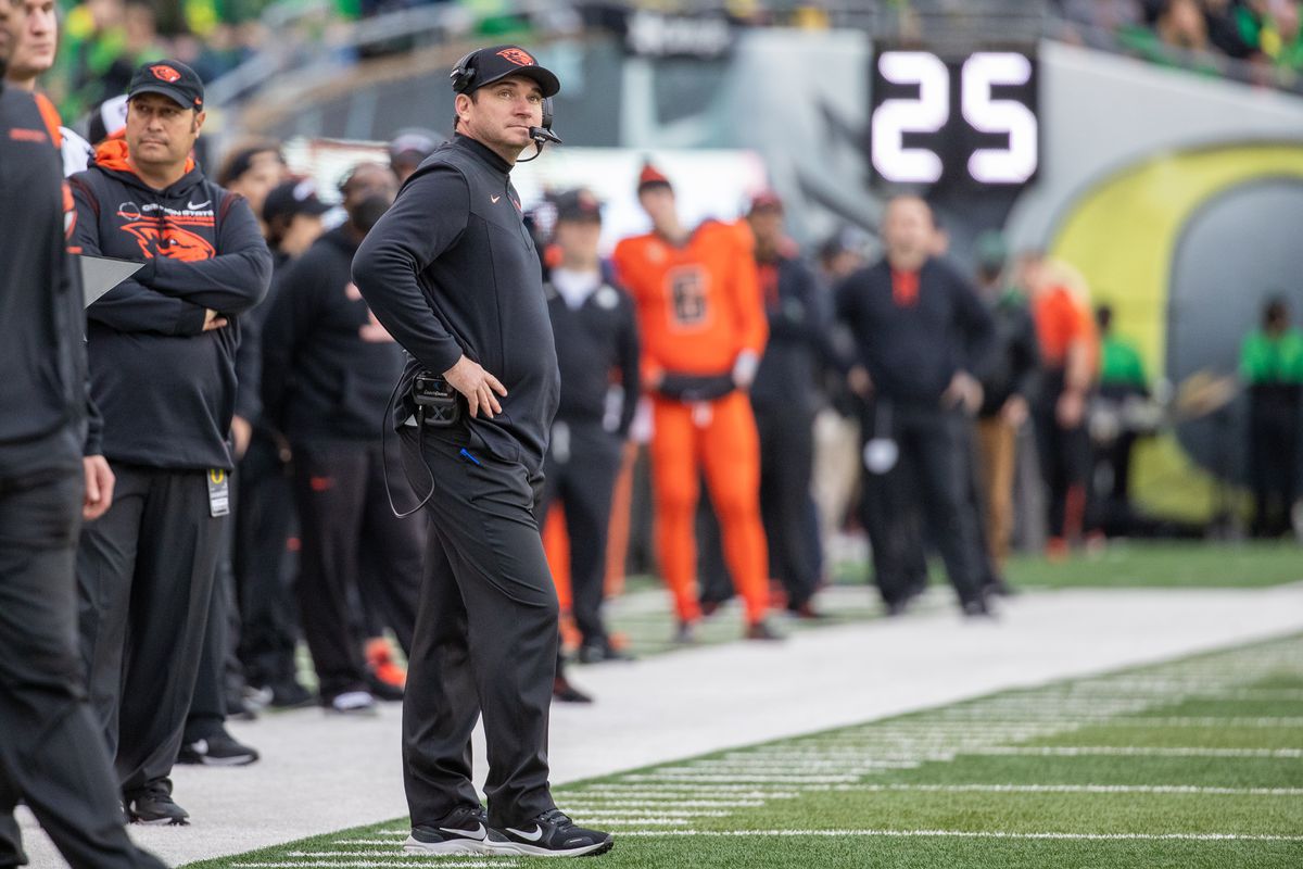 EUGENE, OR - NOVEMBER 27: Jonathan Smith head coach of the Oregon State Beavers stands on the sidelines during their game against the Oregon Ducks at Autzen Stadium on November 27, 2021 in Eugene, Oregon.