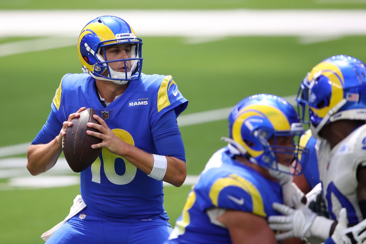 Jared Goff of the Los Angeles Rams rolls out on a play during a team scrimmage at SoFi Stadium on August 29, 2020 in Inglewood, California.