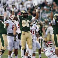 Colorado State tight end Kivon Cartwright (86) celebrates with teammates as the game winning field goal is made against Washington State during the second half of the NCAA New Mexico Bowl college football game, Saturday, Dec. 21, 2013, in Albuquerque, N.M. Colorado State won 48-45.