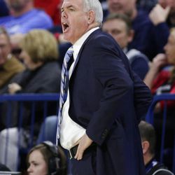 BYU coach Dave Rose shouts to his team during the first half of an NCAA college basketball game against Gonzaga in Spokane, Wash., Saturday, Feb. 3, 2018. (AP Photo/Young Kwak)