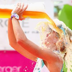 Mirinda Carfrae of Australia celebrates winning the Challenge Roth on July 20, 2014 in Roth, Germany. (Photo by Alex Grimm/Getty Images)