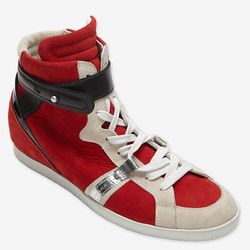 <i><a href=“http://www.intermixonline.com/product/barbara+bui+tri-color+high+top+sneakers.do?sortby=ourPicks&CurrentCat=104686”>Barbara Bui's Tri-Color High Top Sneakers</a>, $137.40 (was $475)</i>