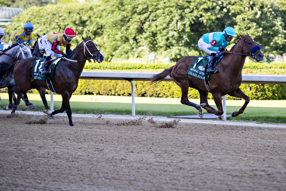 Jockey Martin Garcia rides #1 Charlatan to the lead during the 84th running of The Arkansas Derby Grade 1 at Oaklawn Racing Casino Resort on Derby Day during the Covid-19 Pandemic on May 2, 2020 in Hot Springs, Arkansas.