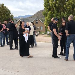 Family and friends gather in La Mora, Sonora state, Mexico, on Thursday, Nov. 7, 2019, for the funeral of three of the nine victims of an ambush attack on Monday. Three mothers and six children were killed by suspected cartel members while driving in a remote, mountainous region in the state of Sonora near the border of Chihuahua.