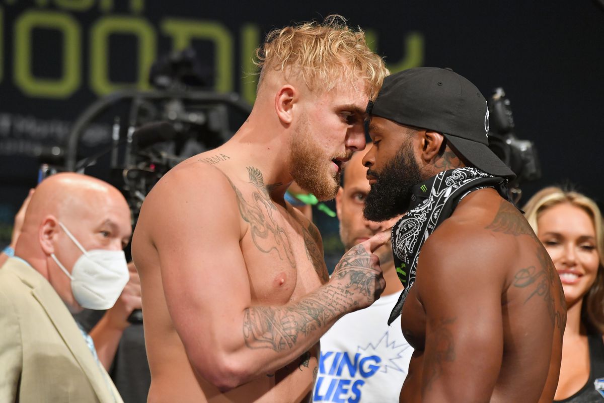 Jake Paul and Tyron Woodley face off during the weigh in event at the State Theater prior to their August 29 fight on August 28, 2021 in Cleveland, Ohio.