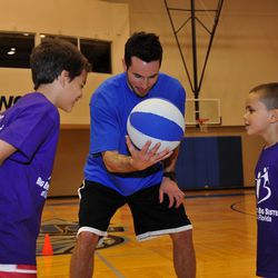 Orlando Magic’s J.J. Redick spends time working with youth from Big Brothers Big Sisters of Central Florida at his basketball clinic, courtesy of the J.J. Redick Foundation, on January 26. 
