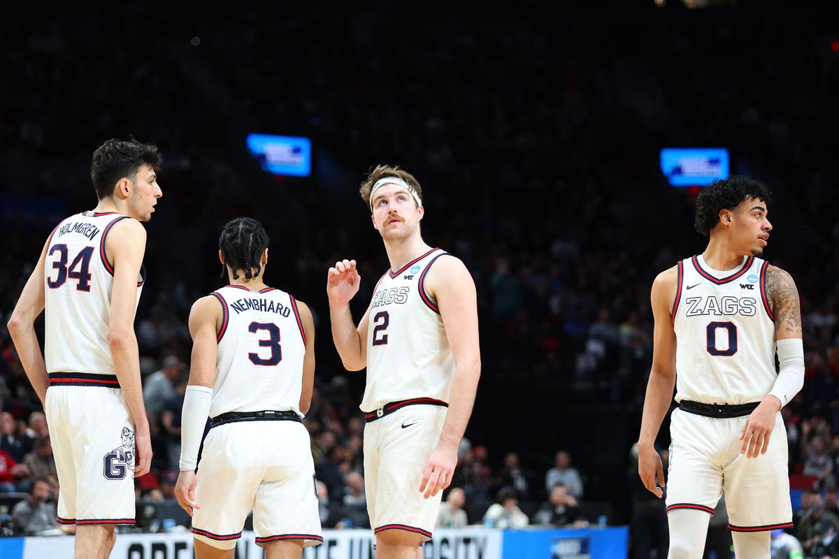 Drew Timme #2 of the Gonzaga Bulldogs and teammates look on before play resumes during the second half against the Memphis Tigers in the second round of the 2022 NCAA Men’s Basketball Tournament at Moda Center on March 19, 2022 in Portland, Oregon.