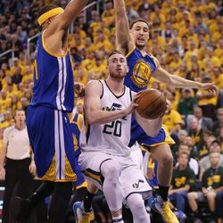 Utah Jazz forward Gordon Hayward (20) drives on Golden State Warriors center JaVale McGee (1) during the second round of the NBA playoffs on Saturday, May 6, 2017.