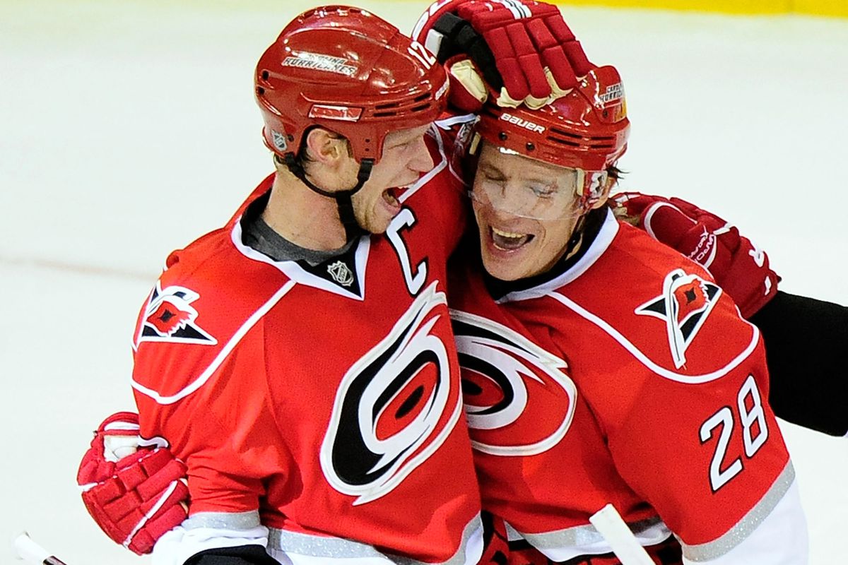 Eric Staal and Alexander Semin celebrate the game winner against the Sabres Tuesday night