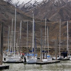 Boats may be towed out of the water due to low water levels at the Great Salt Lake Marina State Park in Magna Tuesday, Feb. 10, 2015.