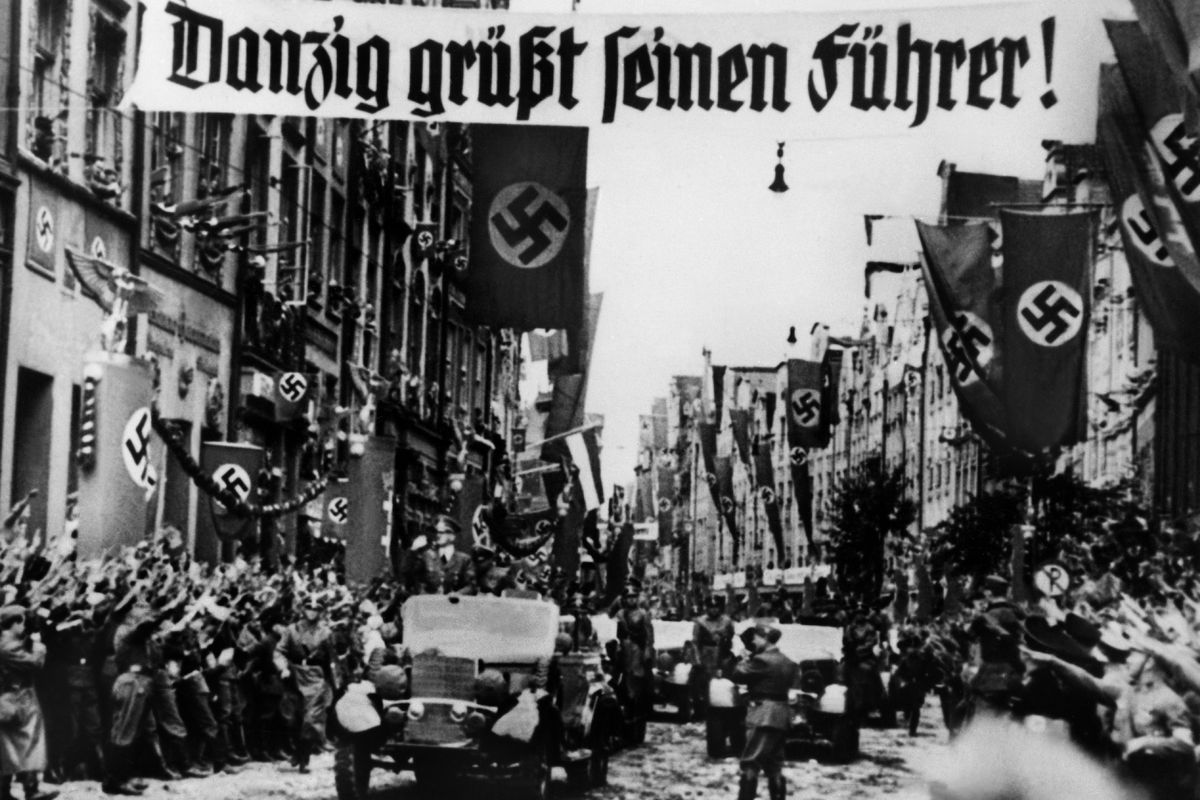 After the invasion of Poland in September 1939, Hitler parades in the streets of the city of Danzig.