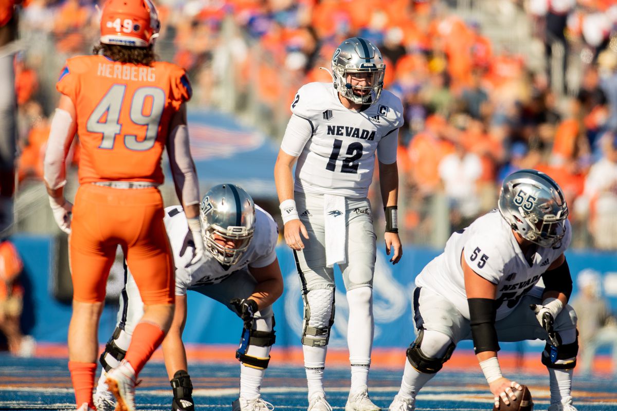 Nevada Wolf Pack quarterback Carson Strong (12) gets ready to run a play during a college football game between the Nevada Wolf Pack and the Boise State Broncos on October 2, 2021, at Albertsons Stadium in Boise, ID.