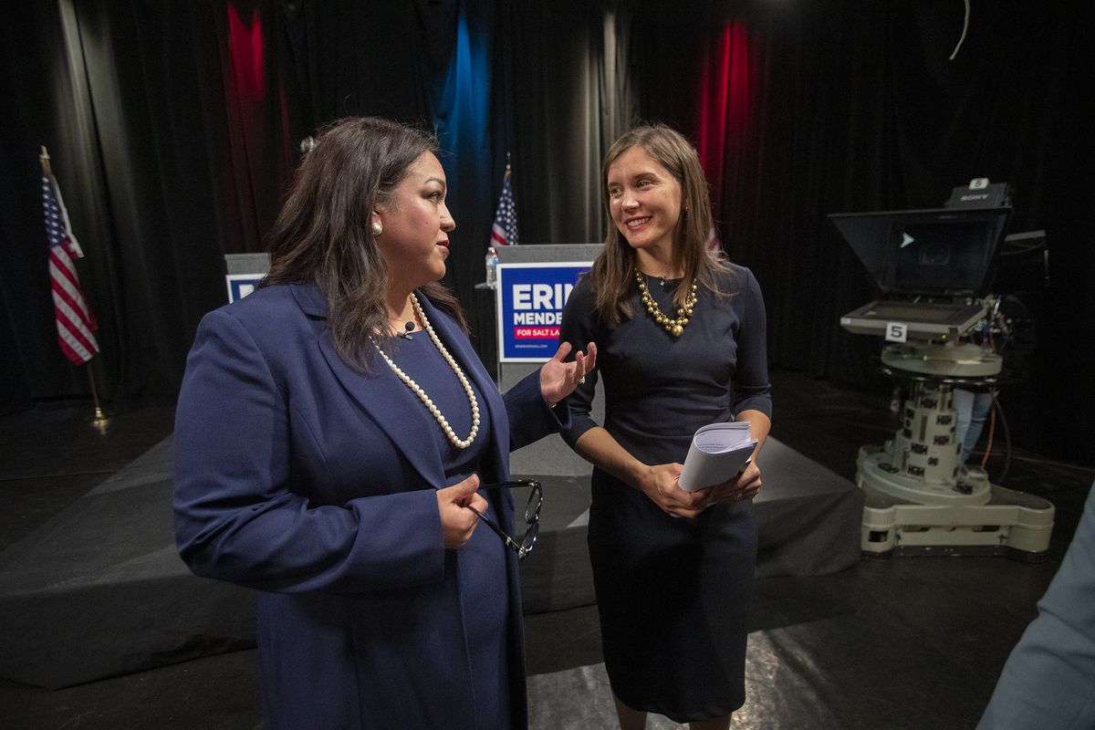 Salt Lake City mayoral candidates Luz Escamilla and Erin Mendenhall chat as they walk off the stage following a televised debate at the Triad Center in Salt Lake City on Monday, Oct. 21, 2019.