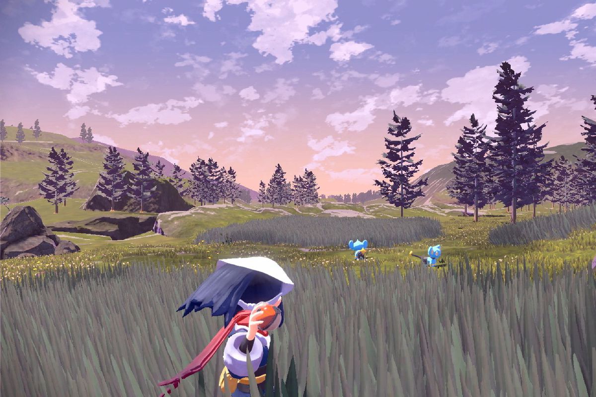 a girl standing in tall grass throwing a Poké Ball in Pokémon Legends: Arceus