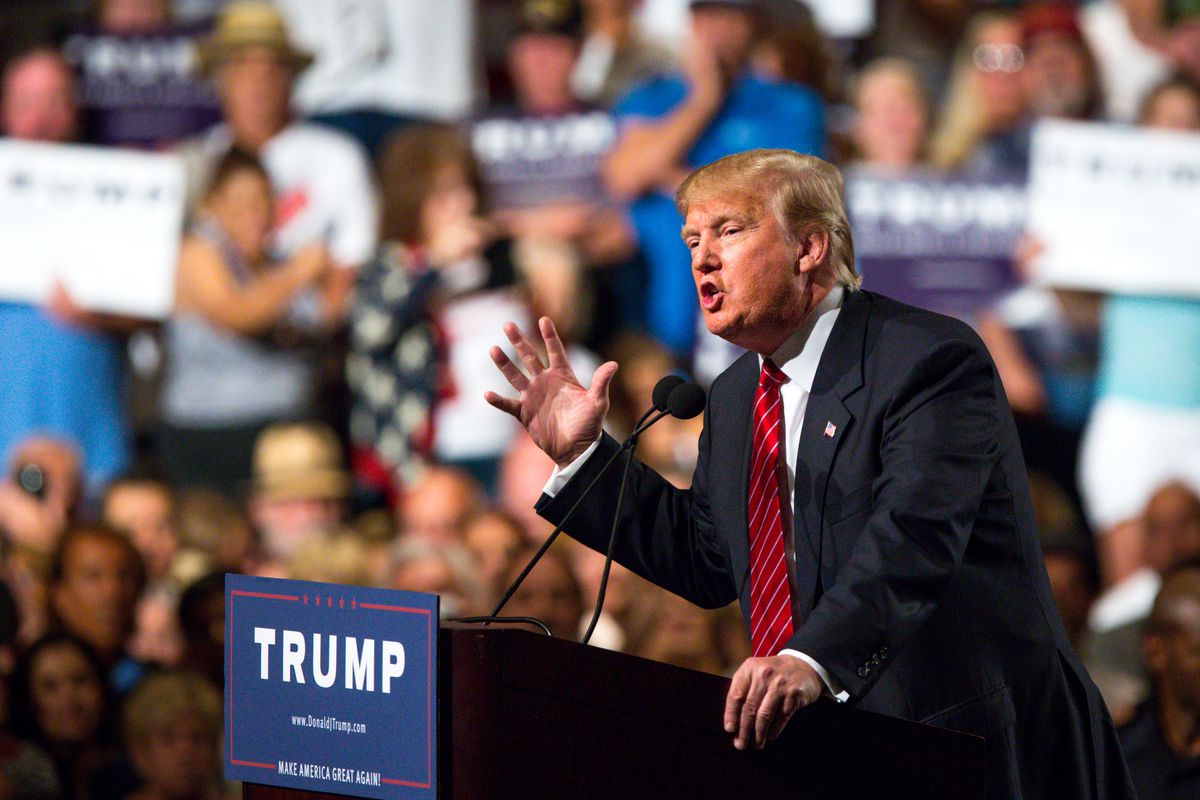 Republican Presidential candidate Donald Trump addresses supporters during a political rally at the Phoenix Convention Center on July 11, 2015 in Phoenix, Arizona.
