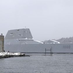 The USS Zumwalt, the Navy's new guided missile destroyer, passes Fort Popham at the mouth of the Kennebec River, as it heads out to sea, Monday, March 21, 2016, in Phippsburg, Maine. The new destroyer, which was built at Bath Iron Works, will undergo final builder trials before the ship is presented to the Navy for inspection. 