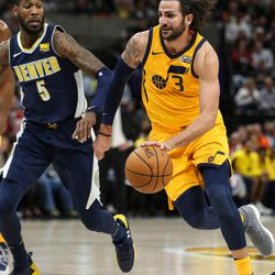 Utah Jazz guard Ricky Rubio (3) drives against Denver Nuggets guard Will Barton (5) at Vivint Smart Home Arena in Salt Lake City on Tuesday, Nov. 28, 2017.