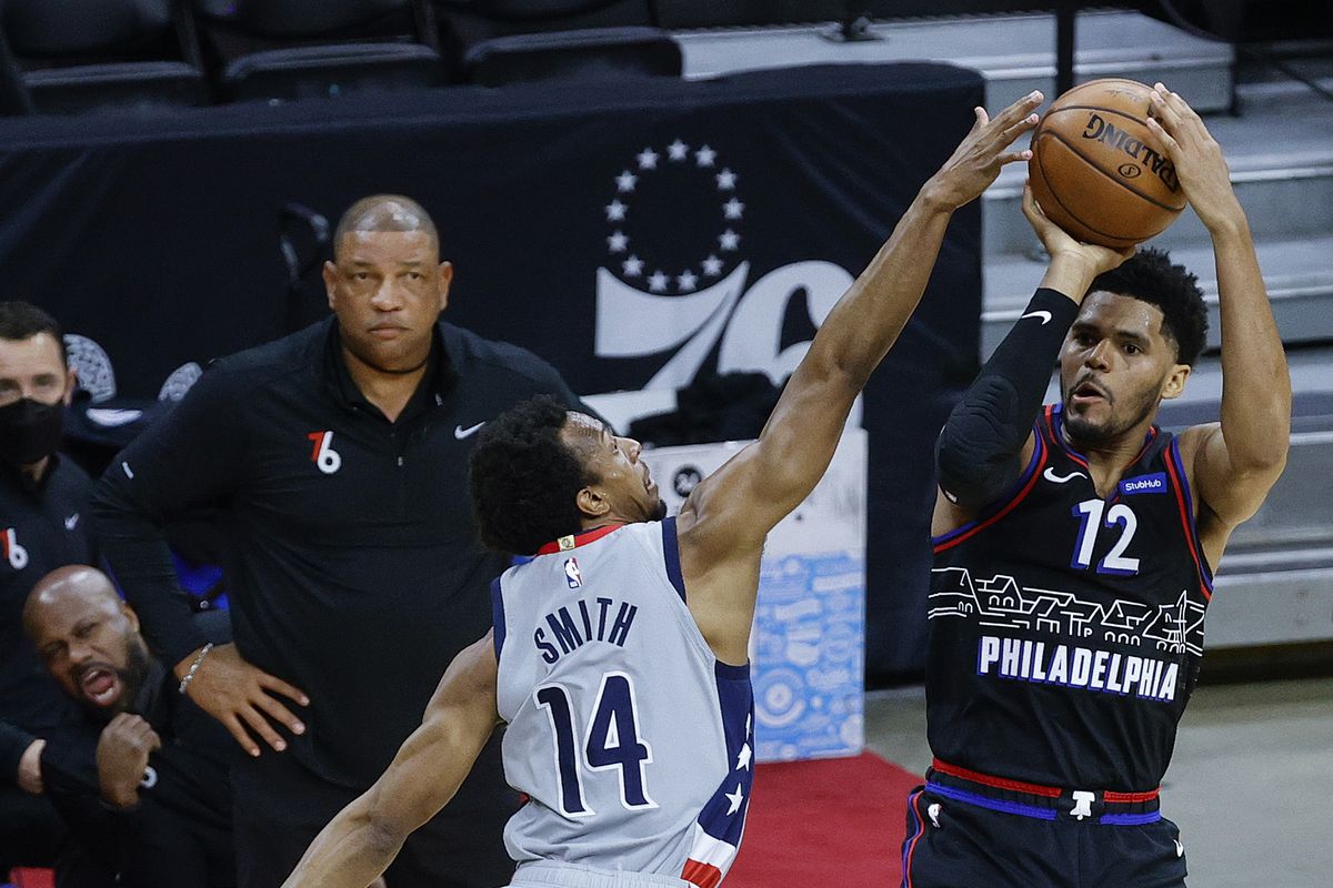 Tobias Harris of the Philadelphia 76ers shoots over Ish Smith of the Washington Wizards during the first quarter during Game One of the Eastern Conference first round series at Wells Fargo Center on May 23, 2021 in Philadelphia, Pennsylvania.&nbsp;