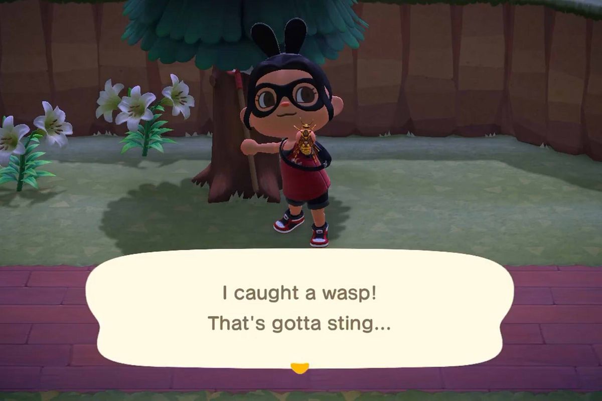 An Animal Crossing character holds up a wasp