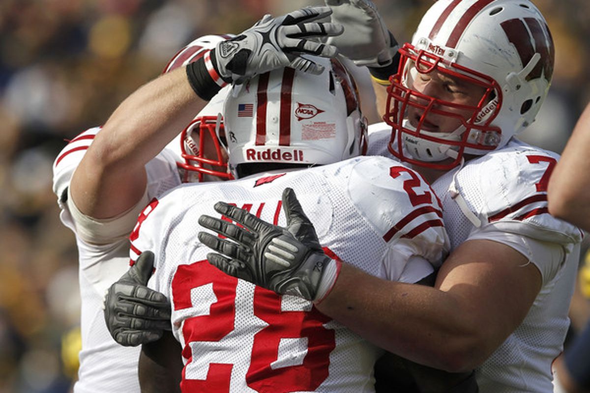 Wisconsin has been doing old school so long, it's downright cool again. The team's unique style has also managed to win them a few football games. 
