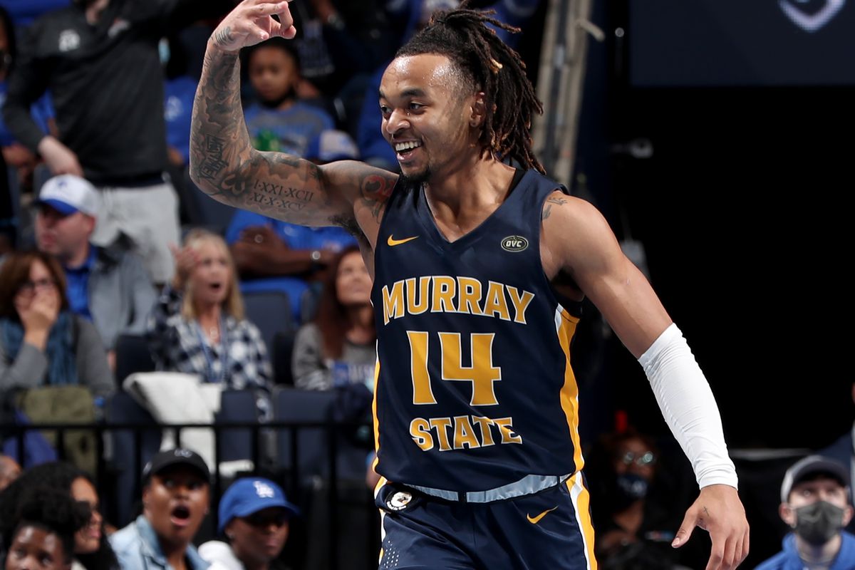 Justice Hill of the Murray State Racers celebrates a 3 point basket against the Memphis Tigers during a game on December 10, 2021 at FedExForum in Memphis, Tennessee. Murray State defeated Memphis 74-72.