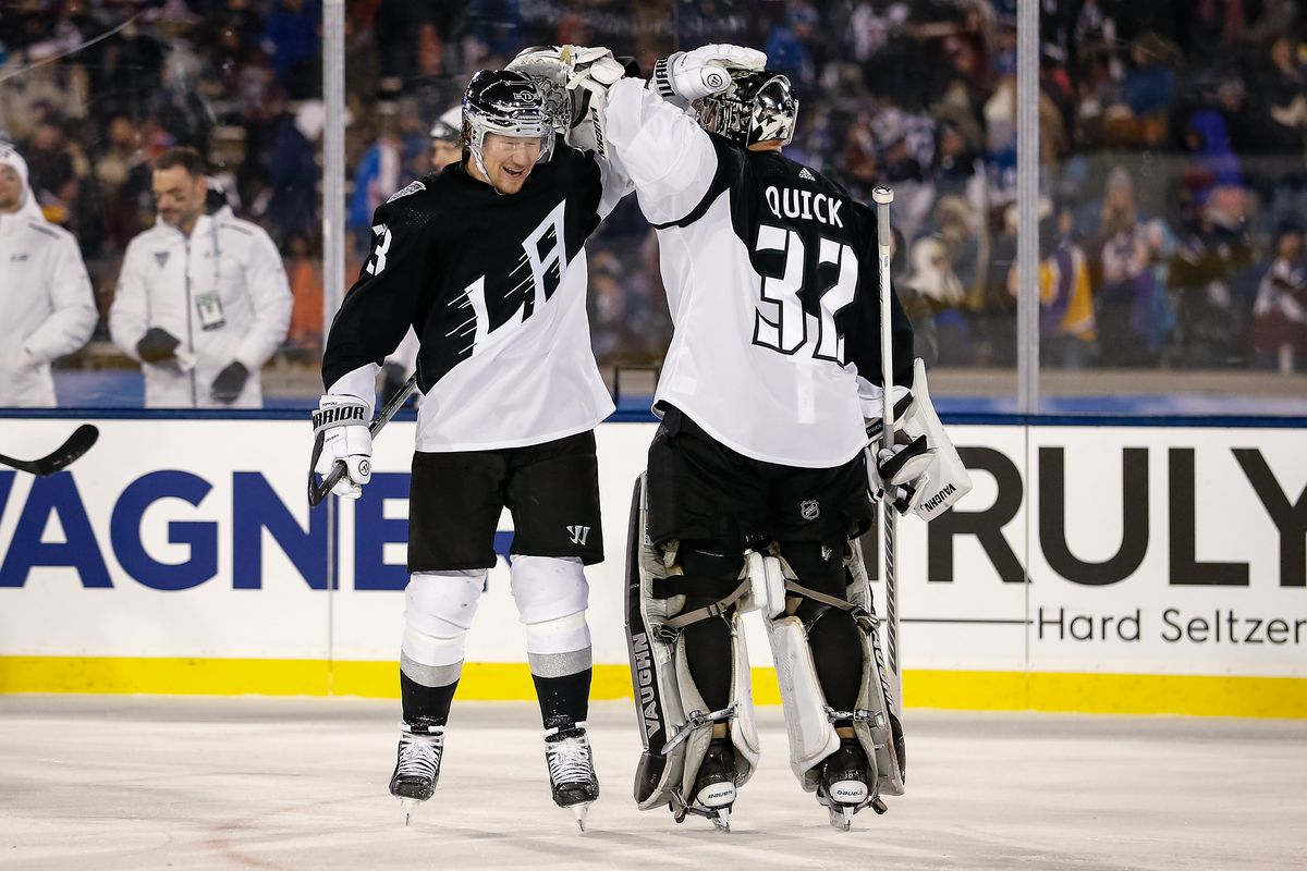 Los Angeles Kings right wing Tyler Toffoli (73) celebrates with goaltender Jonathan Quick (32) after scoring an empty net goal against the Colorado Avalanche in the third period during a Stadium Series hockey game at U.S. Air Force Academy Falcon Stadium.&nbsp;