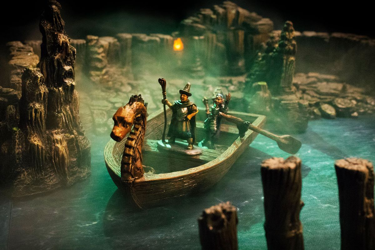 A rowboat in a subterranean river, rendered in miniature.