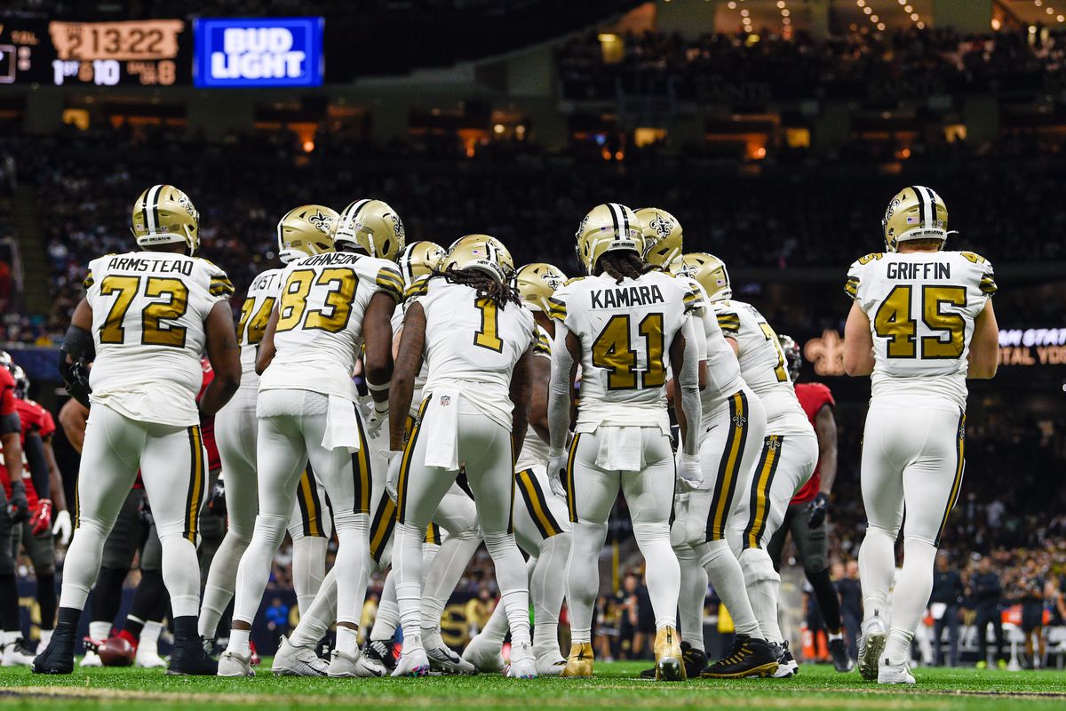 The Saints offense huddles near its own endzone during the football game between the Tampa Bay Buccaneers and New Orleans Saints at Caesar’s Superdome on October 31, 2021 in New Orleans, LA.