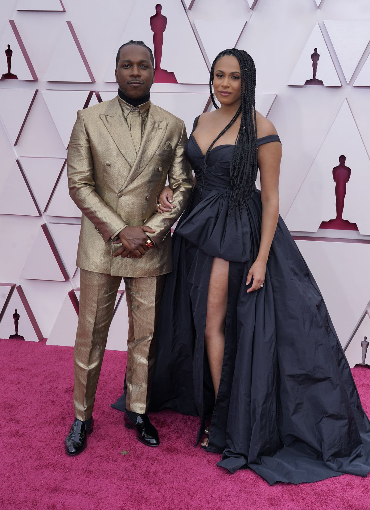 Leslie Odom Jr. and Nicolette Robinson arrive at the Oscars on Sunday, April 25, 2021, at Union Station in Los Angeles.