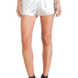 Evil Twin Title Fight Metallic Short, <a href="http://www.revolveclothing.com/evil-twin-title-fight-metallic-short-in-silver/dp/ETWI-WF6/">$61</a>. Whoa, shiny silver shorts! These short shorts could be dressed up with a peplum top and ankle booties or dr