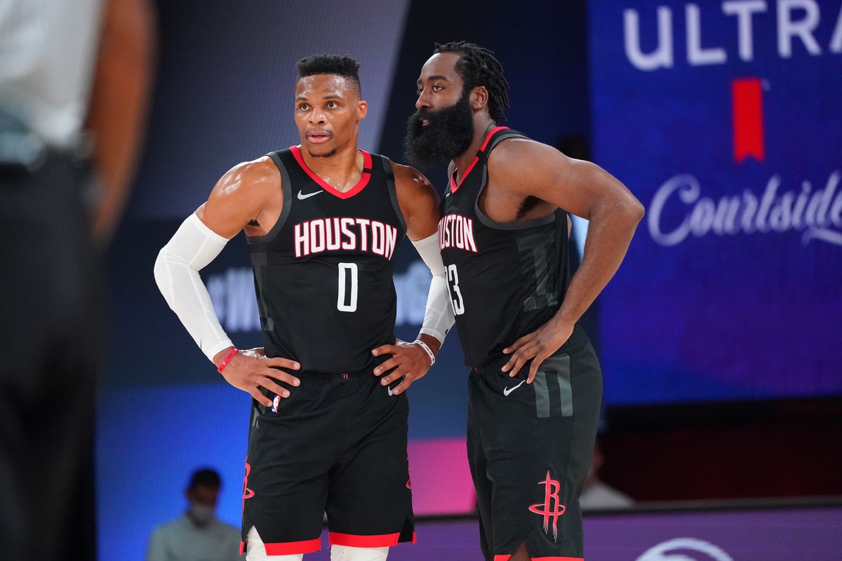 Russell Westbrook of the Houston Rockets and James Harden of the Houston Rockets talk during a game against the Los Angeles Lakers during Round Two, Game Three of the Western Conference Semifinals on September 8, 2020 at the AdventHealth Arena at ESPN Wide World Of Sports Complex in Orlando, Florida.