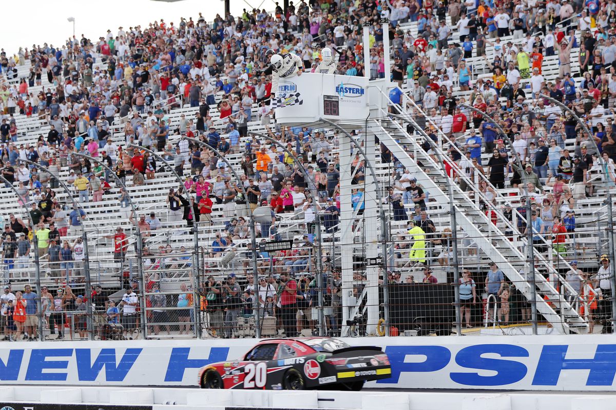 Christopher Bell, Xfinity Series driver of the Rheem Toyota (20), takes the checkered flag to win the Xfinity Series Lakes Region 200 on July 21, 2018, at New Hampshire Motor Speedway in Loudon, New Hampshire.